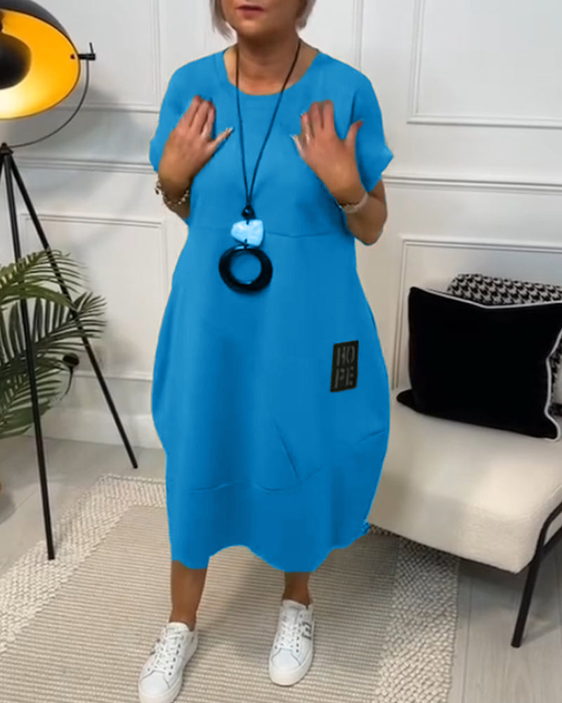 Nicola | Relaxed Pocket Midi Dress