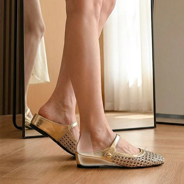 Freya woven square-toe mules in gold – angle view